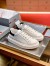 Prada Women's Macro Sneakers In White and Black Leather 