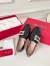 Roger Vivier Mini Broche Buckle Loafers in Black Patent Leather