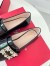 Roger Vivier Mini Broche Buckle Loafers in Black Patent Leather