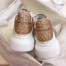 Alexander McQueen Women's Oversized Sneakers With Gold Glitter Heel