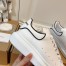 Alexander McQueen Women's White/Black Oversized Sneakers